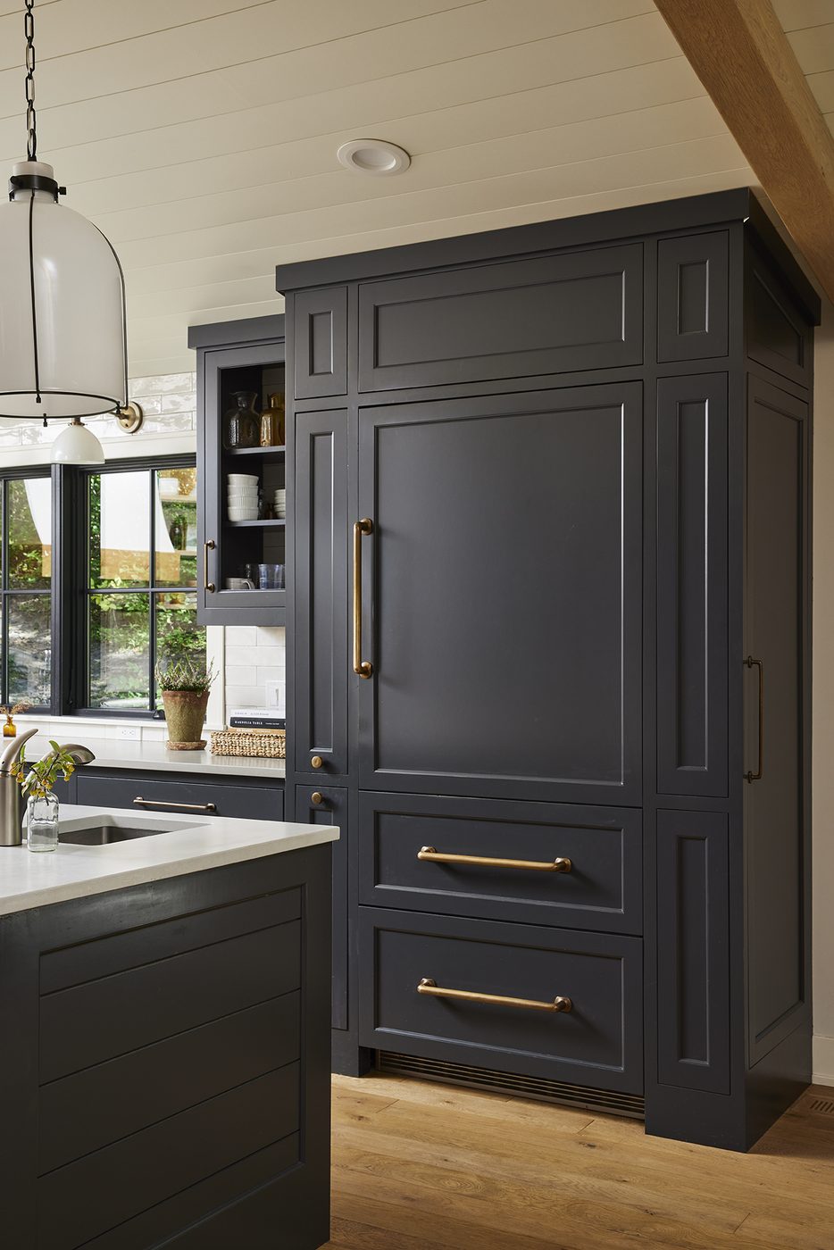 Painted inset panelled refrigerator with brass pulls