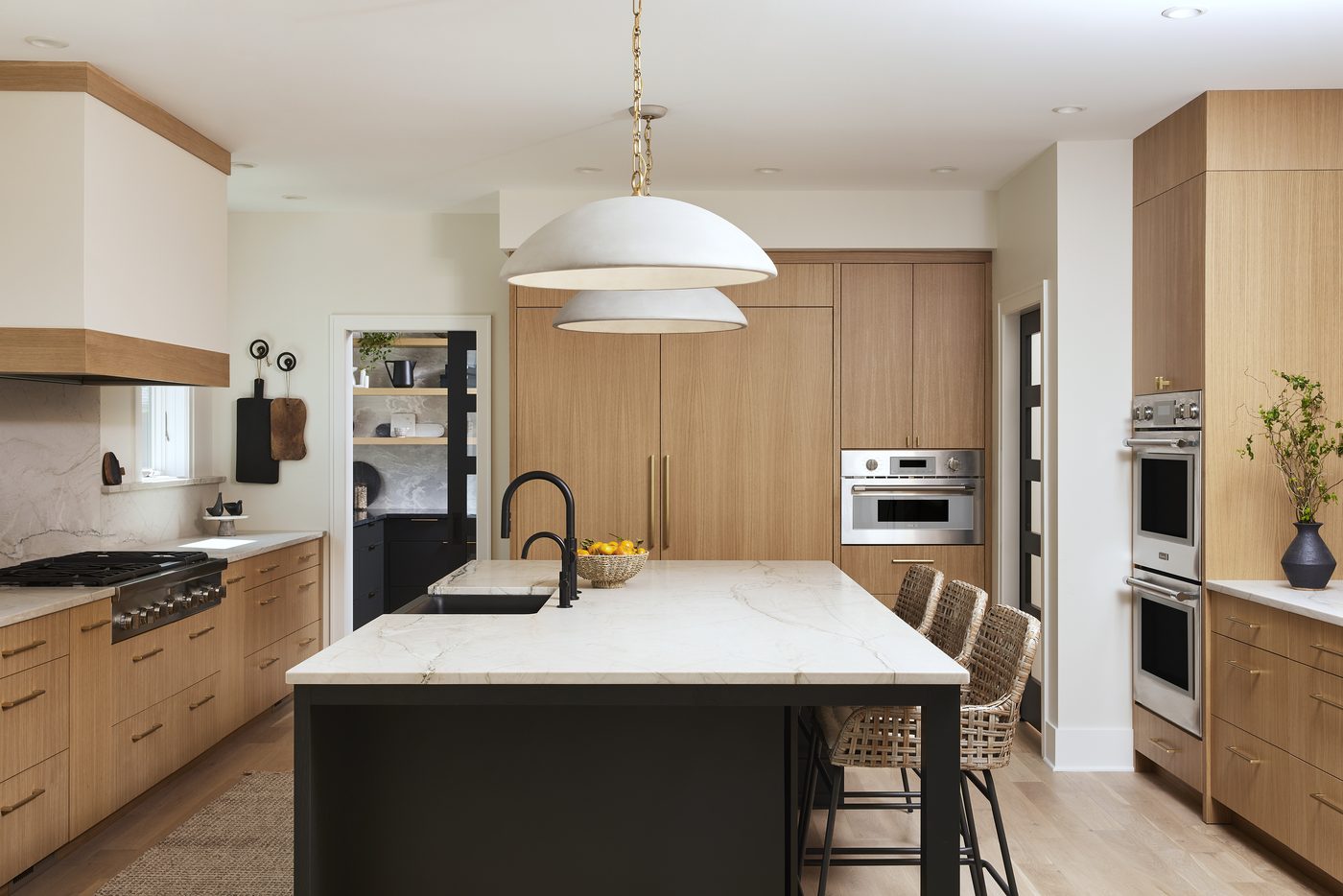 Rift white oak kitchen with black island